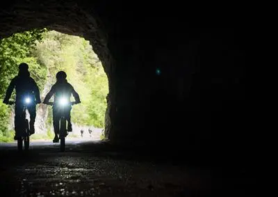 Cyclists with X-Connect lights on
